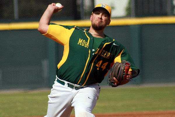 nick gambardella tosses a pitch at la verne
