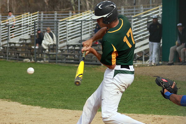 dan mason swings at the ball