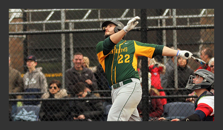 nick guajardo follows through on a swing after hitting the ball