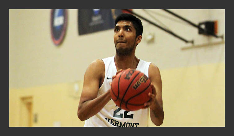 rohan piple holds the ball and gets ready to shoot it