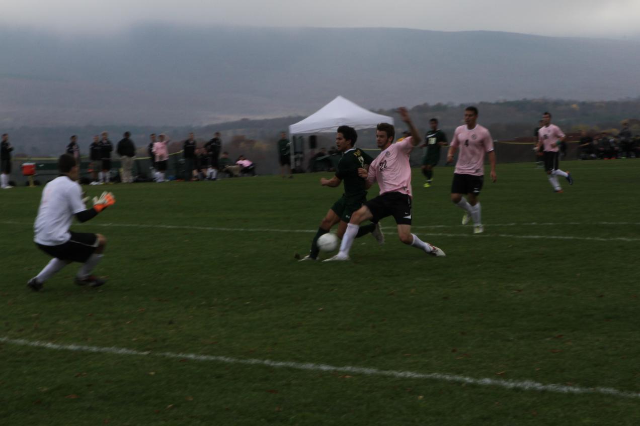 Men's Soccer Returns to NECC Playoffs with 2-1 Win Over Newbury in Senior, Pink Out Day