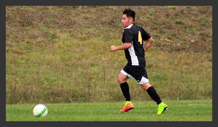 omar santiago dribbles the ball