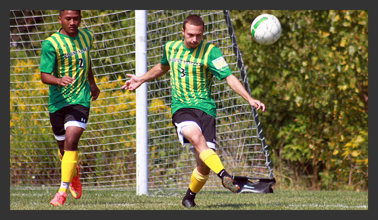 sam duchesneau kicks the ball