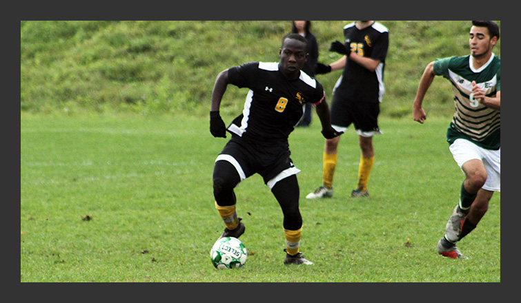 raynolds awusi dribbles the ball