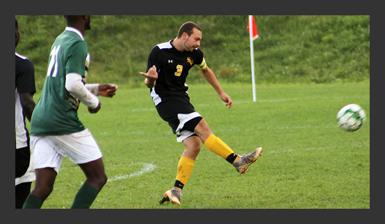 sam duchesneau kicks the ball