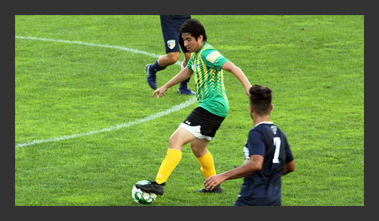 esteban de la cruz controls the ball with his foot