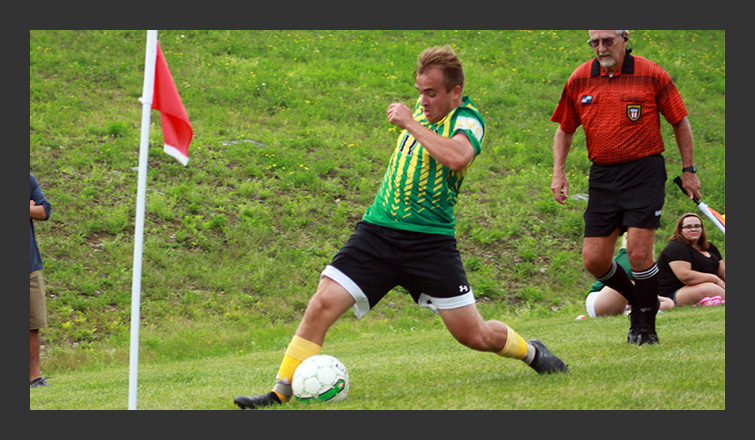 nik joseph lunges for the ball