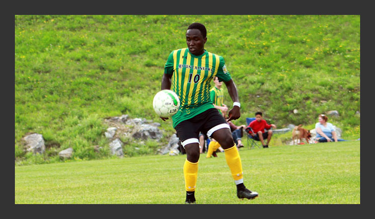 nick langat controls the ball