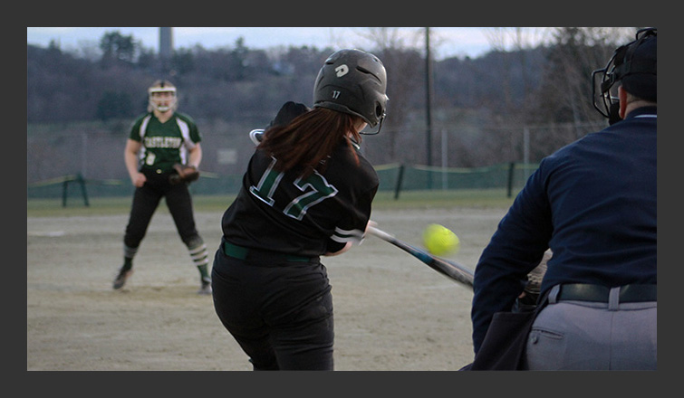 colleen thompson swings at a pitch