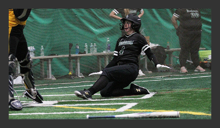 brandi johnson slides into home plate