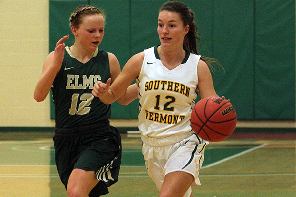 taylor mallett dribbles the ball up the court for SVC