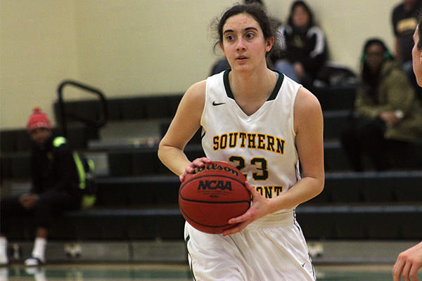 sarah poirier looks to pass the ball
