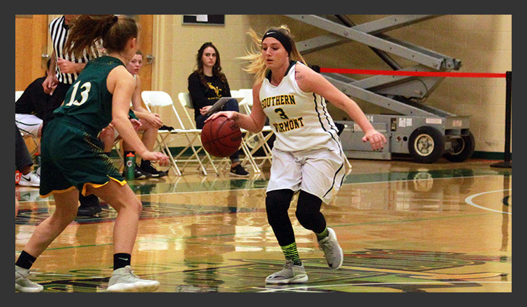 kayla emmi dribbles the ball