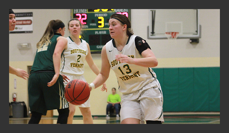 dani biggers dribbles the ball