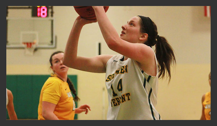 brenna hudson goes up for a shot