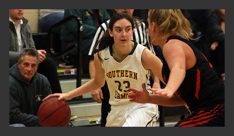 sarah poirier dribbles the ball