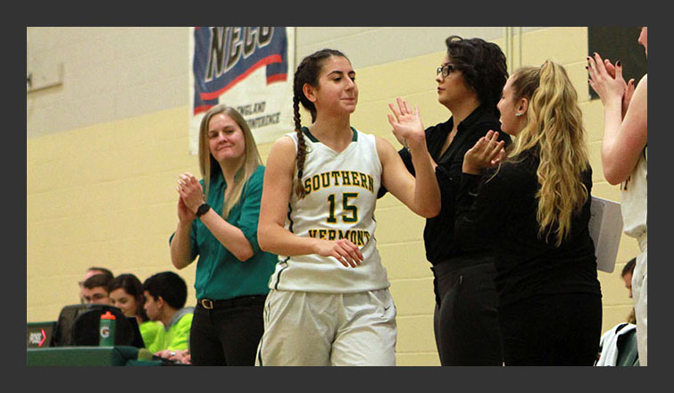stephany ferreira slaps five with teammates