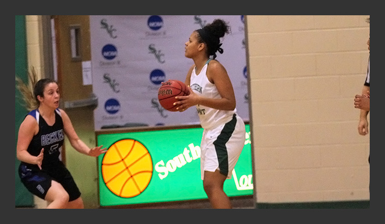 reileigh harvey holds the ball looking to pass it