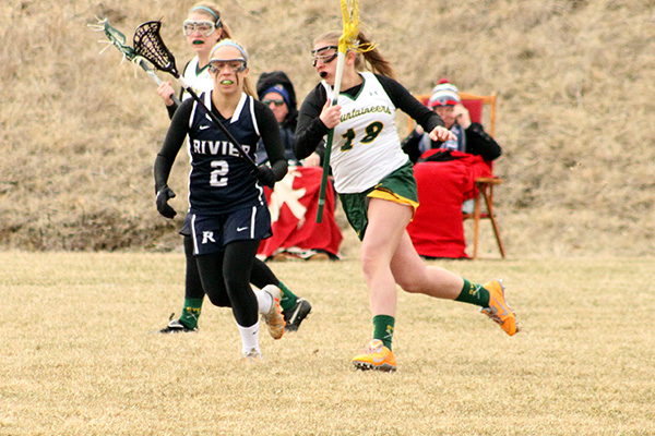 Women's Lacrosse Sunk 18-7 by Rivier in Season Opener