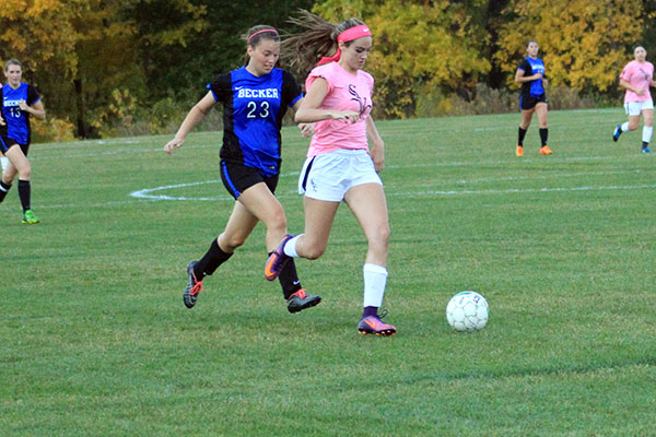 Women's Soccer Secures Playoff Berth with 4-2 Win Over Becker