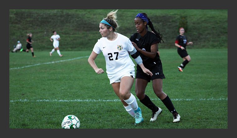 julia lafiora dribbles the ball