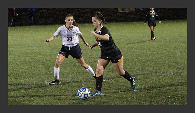 megan macdonald dribbles the ball