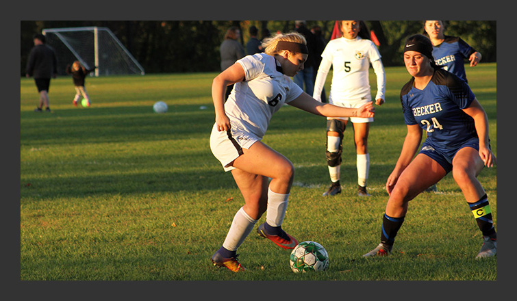 alexis hufnagel dribbles the ball