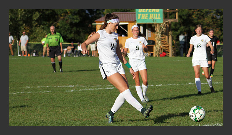 izabella coleman kicks the ball