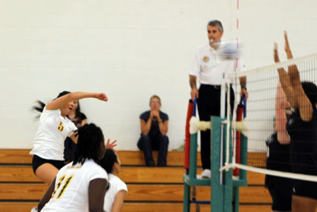 Veliz (5) hitting, Smith (11)