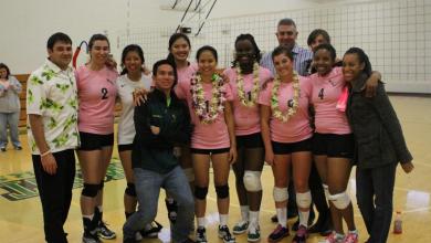 Seniors with family, friends, and teammates