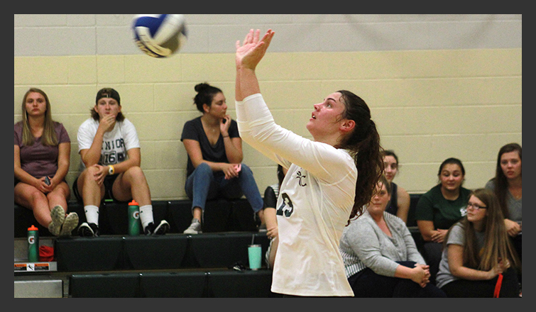 Liv sowles hits the ball